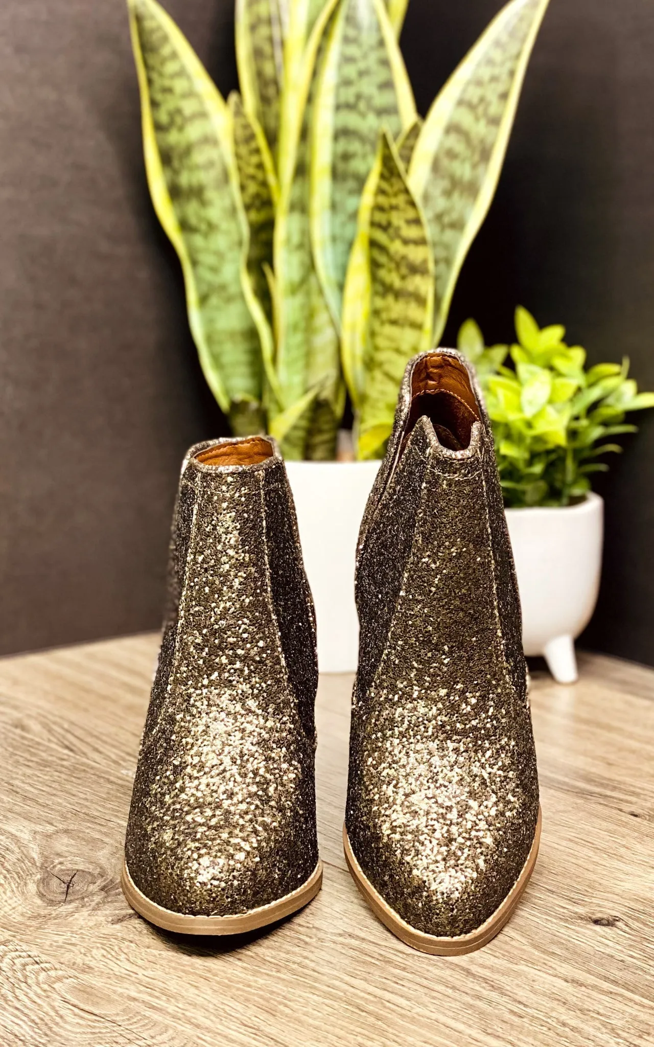 Fiera Booties in Bronze by Not Rated