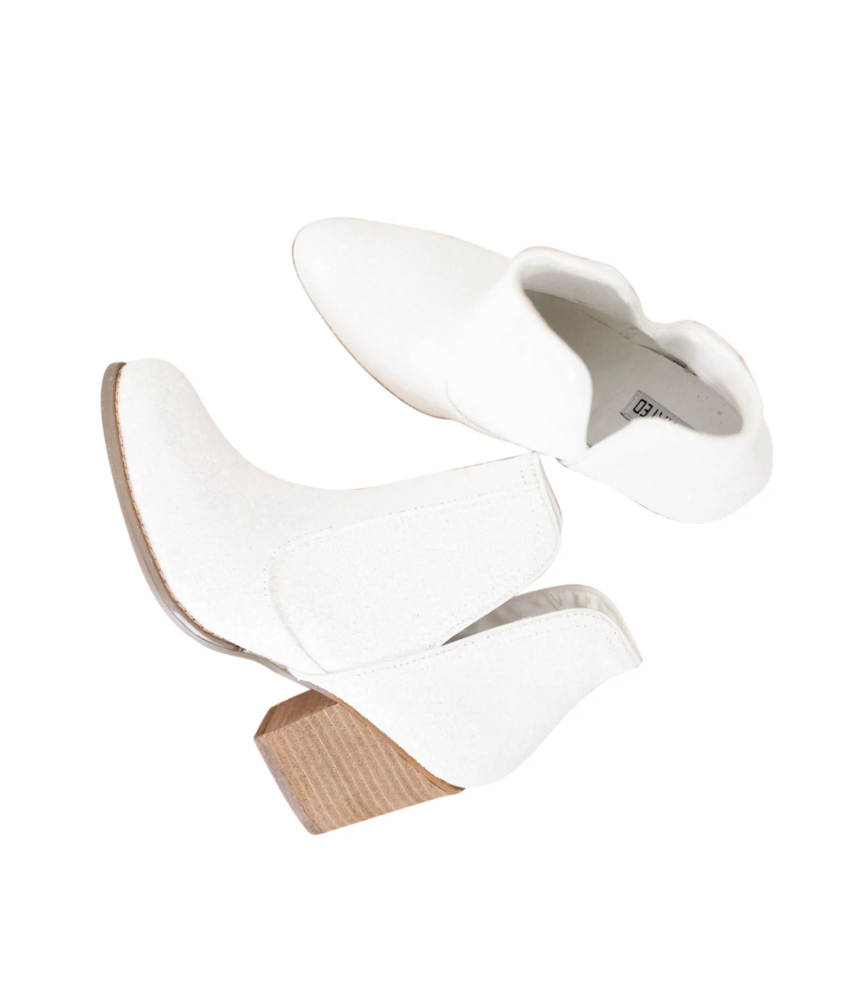 Fiera Booties in White by Not Rated